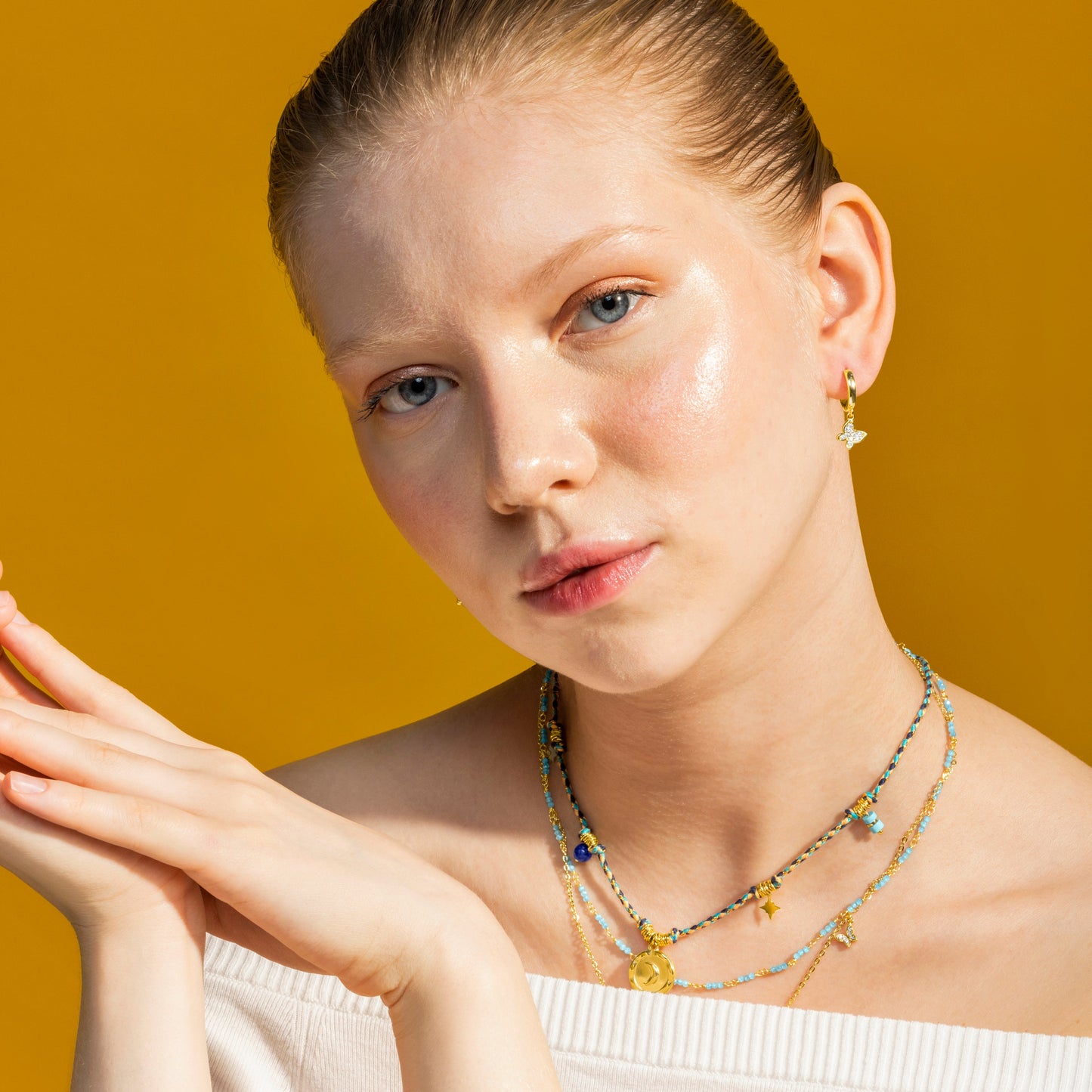 Collar con Cristal Azul Oscuro acabado oro 18k - Liskel