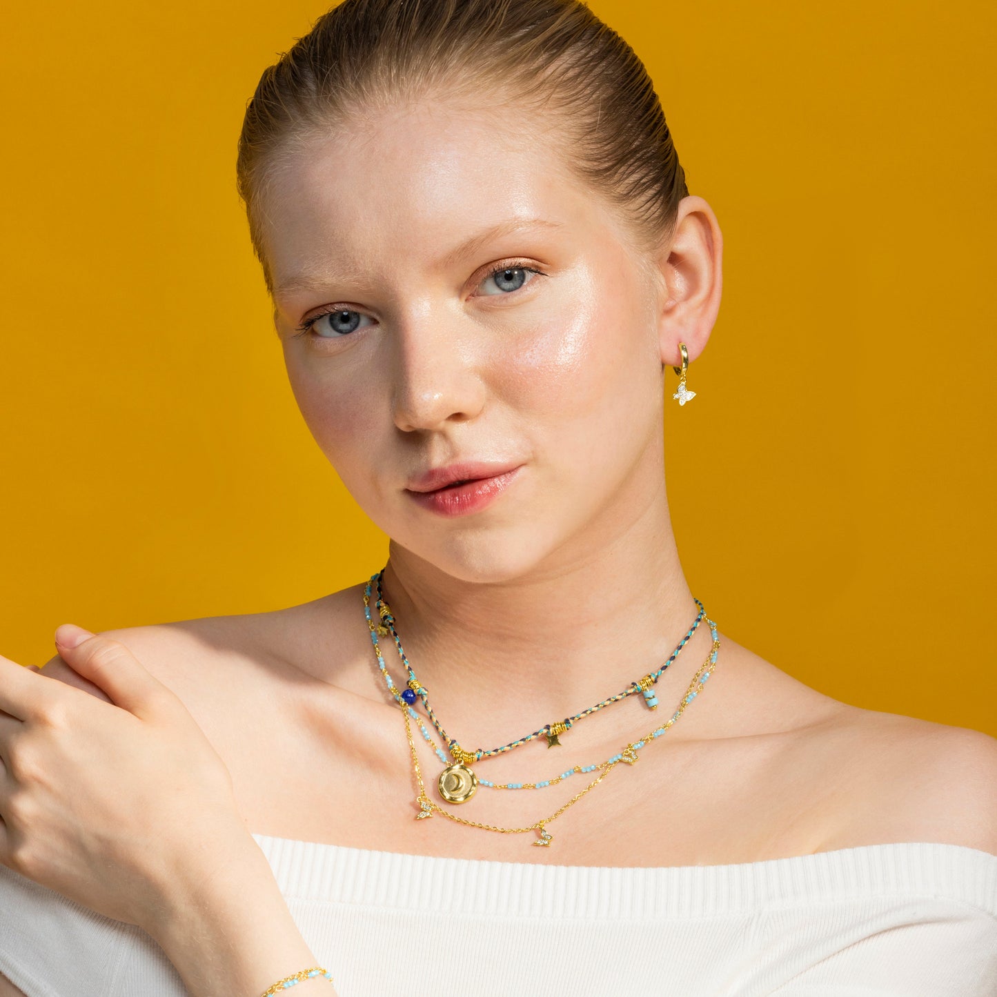 Collar con Cristal Azul Oscuro acabado oro 18k - Liskel